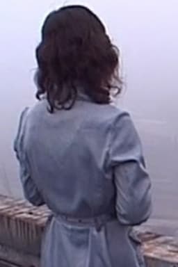 Woman Dancing on the Roof