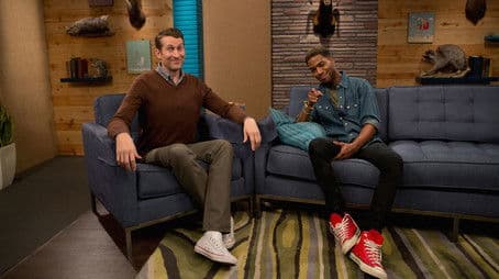 Kid Cudi Wears a Denim Shirt and Red Sneakers