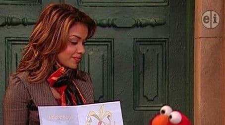 Elmo Wishes for a Pet Dinosaur