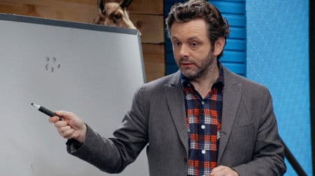 Michael Sheen Wears a Plaid Button Down and Grey Blazer