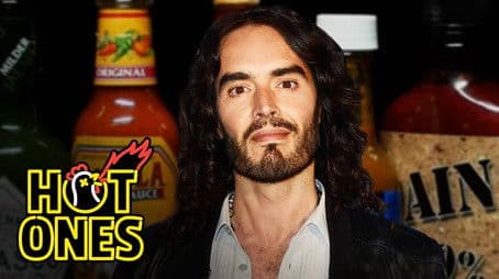 Russell Brand Serenades Superfan Brett Baker While Eating Spicy Wings