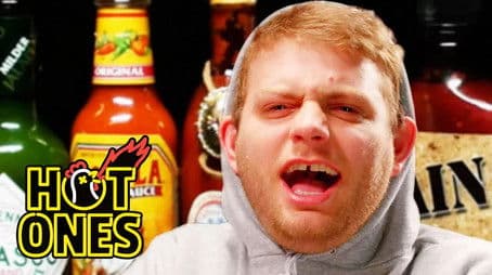 Mac DeMarco Tries to Stay Chill While Eating Spicy Wings