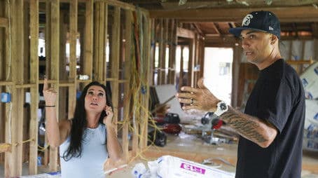 House Held Up by Car Jacks